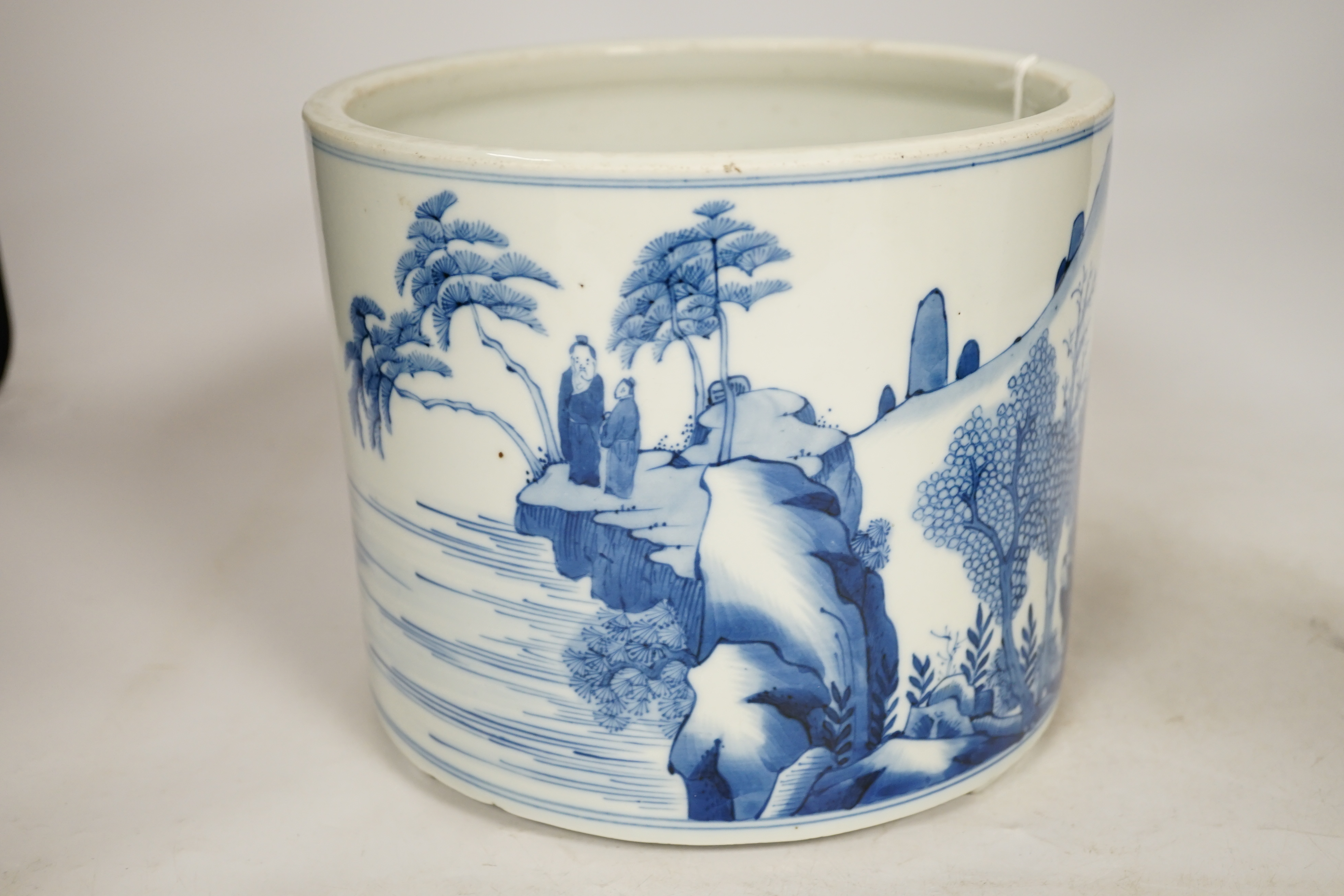 A Chinese blue and white brushpot, 17cm high. Condition - good